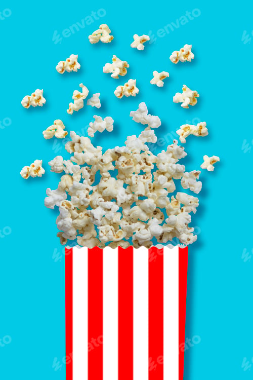 Preview: Paper cup with popcorn on blue background - Clipping path