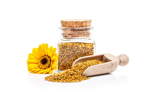 Preview: Bee Pollen Grains with Yellow Flower and Wooden Spoon