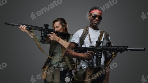 Preview: Brutal black guy with sunglasses and woman with rifle