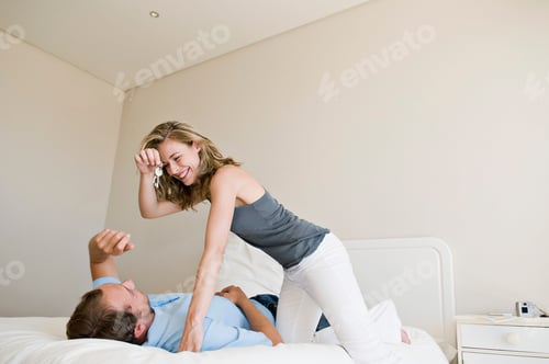 Preview: A couple in their bedroom.