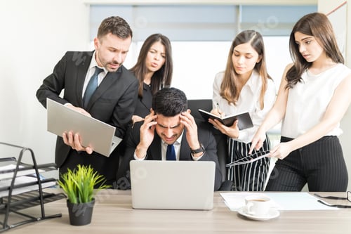 Preview: Male Business Executive Missing Deadline At Desk