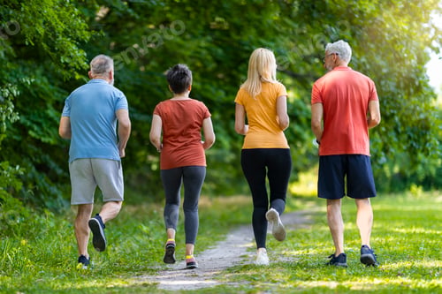 Preview: Rear View Shot Of Senior People In Sportswear Jogging Outdoors