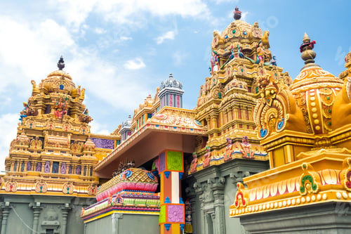 Preview: Part of a beautiful and colorful Indian temple in Mauritius Island. Close-up on sculptures and