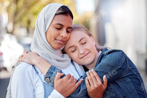 Preview: Friends, women and hug outdoor, peace and reunion in street together, happiness and calm. Females w