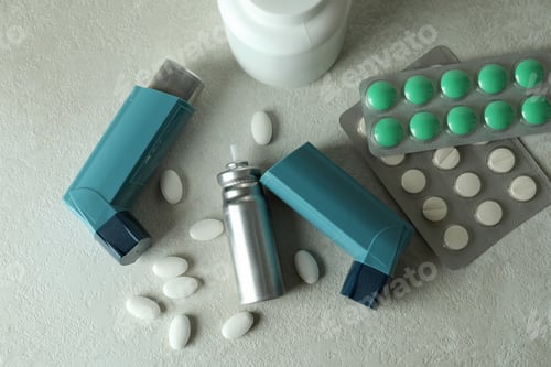 Preview: Asthma treatment accessories on white textured table