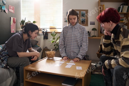 Preview: Teenagers Playing Card Game