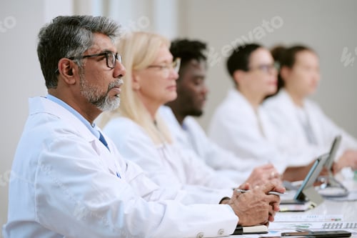 Preview: Diverse Group of Middle Aged and Young Adult Doctors Attending Conference