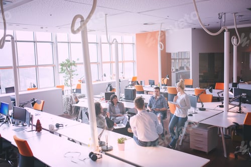 Preview: Young Business Team At A Meeting at modern office building