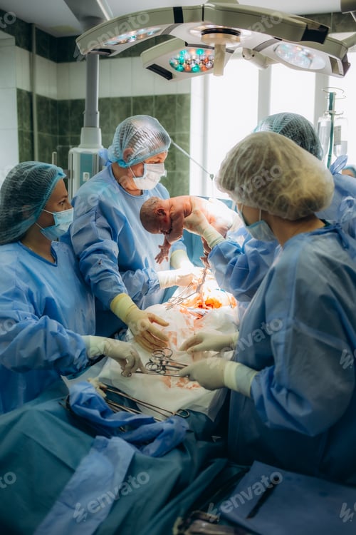 Preview: Baby being born via Caesarean Section coming out