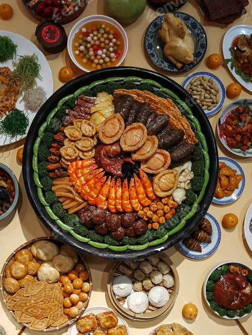 Preview: top view of Chinese delicacies during Chinese New year celebration in a restaurant. fake food.