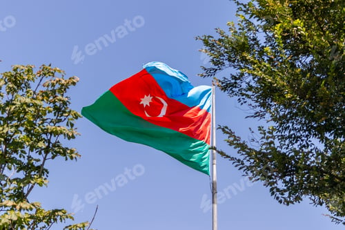 Preview: Azerbaijani flag waving in the wind on a sunny day
