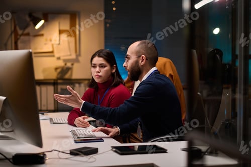 Preview: IT Developer Pointing at Computer Screen