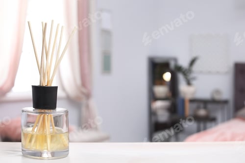 Preview: Reed freshener on table indoors