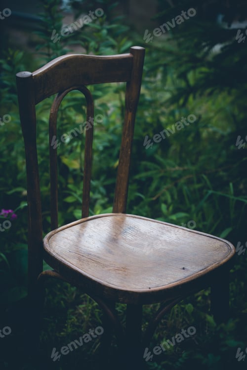Preview: Antique chair in a garden
