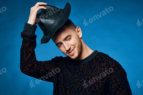 Preview: Cheerful man in black hat fashion modern style posing
