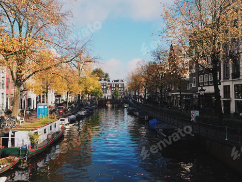 Preview: View of Amsterdam canal in autumn fall