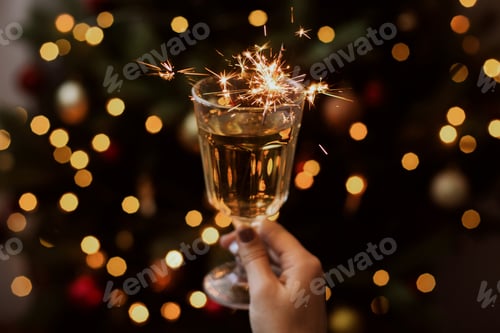 Preview: Burning sparkler in champagne glass