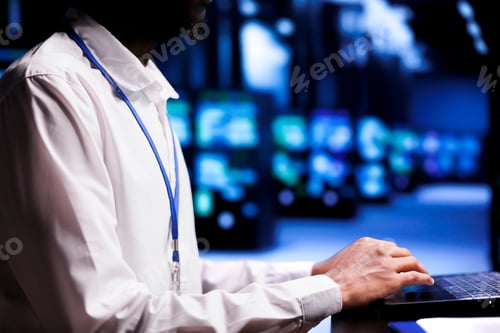 Preview: Admin examining supercomputer