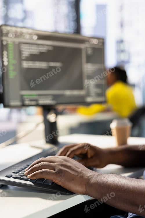 Preview: Programmer typing on keyboard, developing machine learning APIs, close up