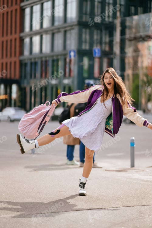 Preview: Portrait of pretty young woman, having fun at the street