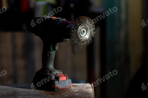 Preview: Close-up of a drill on a rusty metallic table