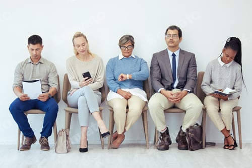 Preview: Shot of a group of people waiting to be interviewed for a job at a modern office