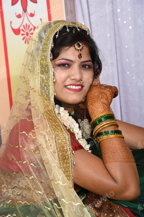 Preview: Indian bride wearing traditional wedding cloths in marriage ceremony.