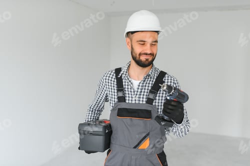 Preview: Portrait of a builder on a construction site indoors