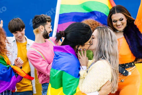Preview: LGBTQ community people with rainbow flag celebrating gay pride festival day.