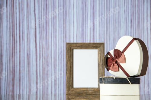 Preview: front view valentines day presents with empty picture frame on light background love passion couple
