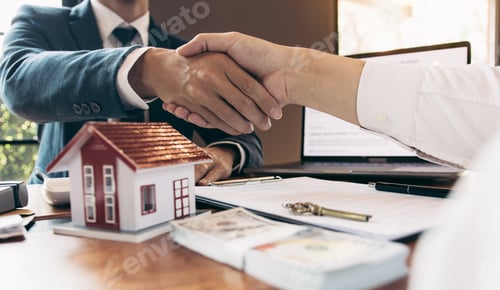 Preview: Home sales agents and buyers work on signing new homes and shaking hands.