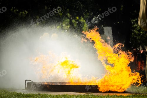 Preview: Fire flame in a firefighting training exercise. Firefighter training Concept.