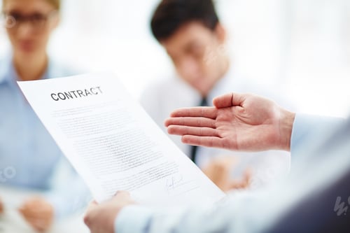 Preview: Business contract in hand