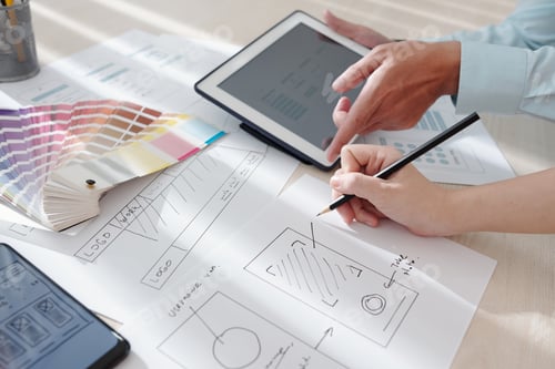 Preview: Team of Designers Working on Interface