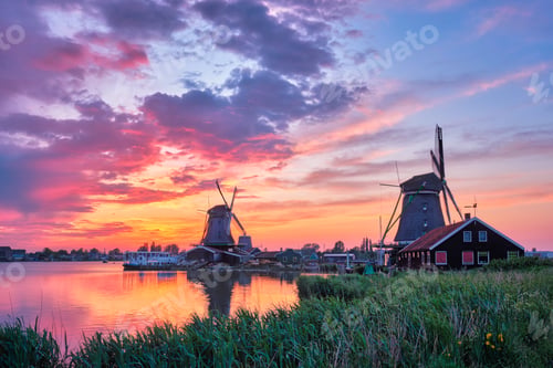 Preview: Windmills at Zaanse Schans in Holland on sunset. Zaandam, Nether