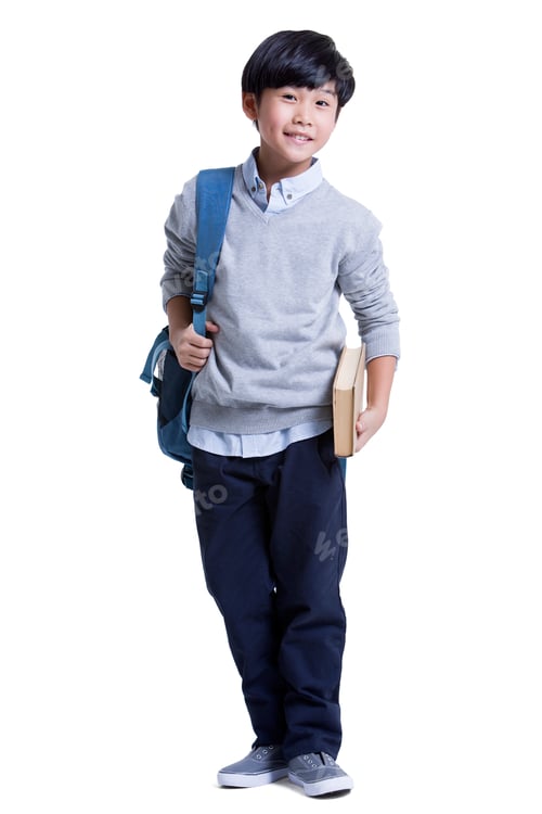 Preview: Cute schoolboy with book in hand