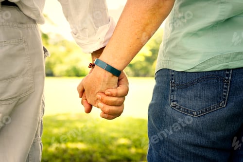 Preview: Senior couple holding hands