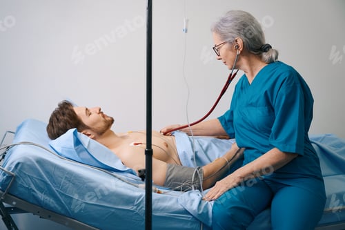 Preview: Bearded man lies under a drip with a naked torso