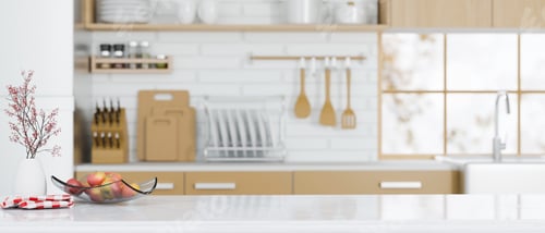 Vista previa: white granite kitchen countertop island on modern Scandinavian kitchen space.