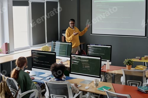 Preview: Teacher Working in Computer Science Class