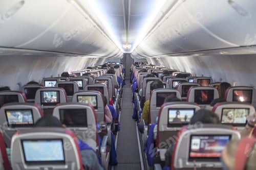 Preview: Passengers traveling by a new jet plane, shot from the inside of an airplane