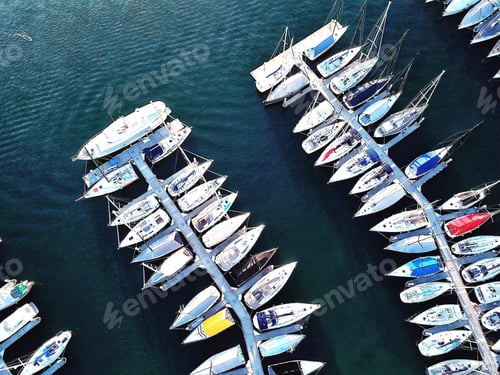 Preview: Sailing boats moored at a marina as seen from a drone