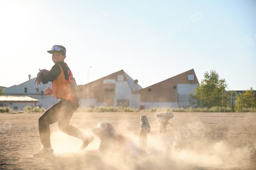 Preview: Baseball players sliding into base creating dust cloud