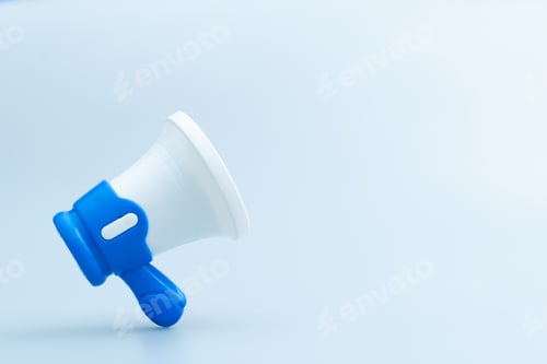 Preview: A megaphone on a blue background with copy space.