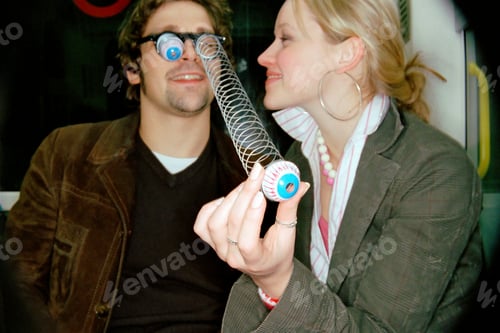 Preview: Couple playing on subway train