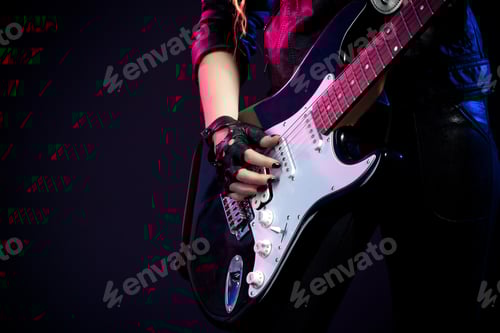 Preview: Guitarist Wearing Leather Playing Electric Guitar