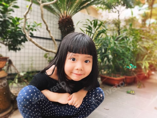 Preview: Asian girl at own garden