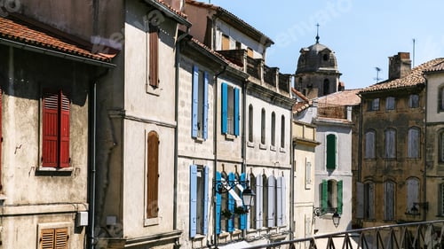 Preview: facades of old apartment houses in Arles city