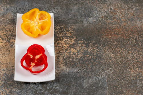 Preview: Sweet pepper in the plate , on the marble background