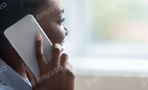 Preview: Mobile Communication. Closeup Portrait Of African American Woman Having Phone Call